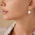 18kt yellow gold diamond-studded mother of pearl earrings