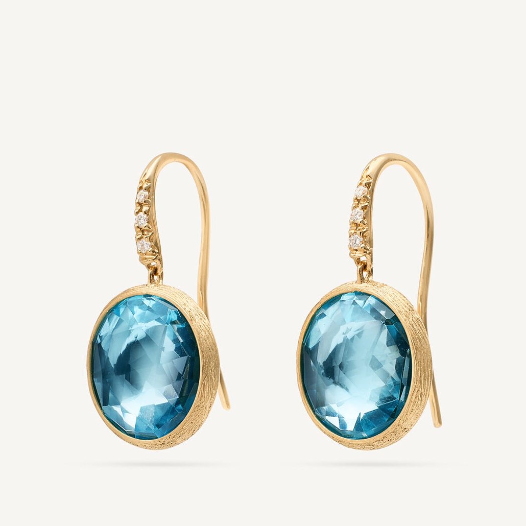 18kt yellow gold ring diamond-studded earrings with sky topaz