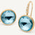 18kt yellow gold ring diamond-studded earrings with sky topaz
