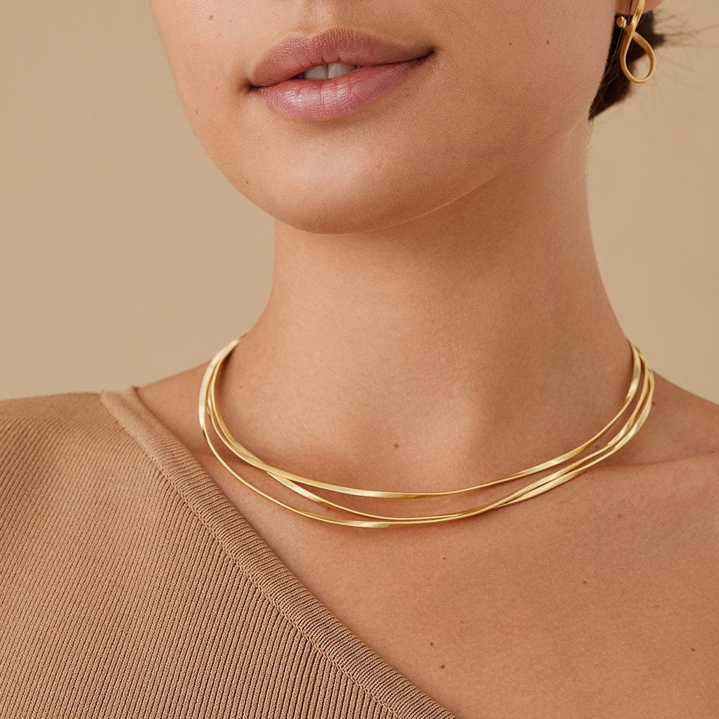 18kt yellow gold three-strand coil necklace