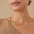 18kt yellow gold three-strand coil necklace