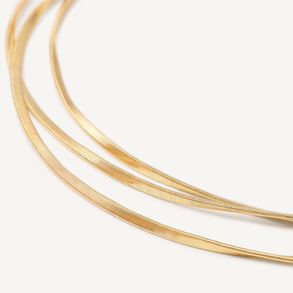 18kt yellow gold three-strand coil necklace