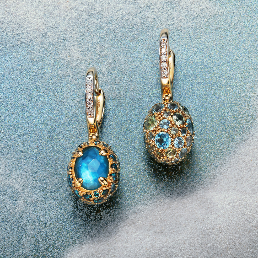 Nanis 18k gold earrings with blue and green gemstones